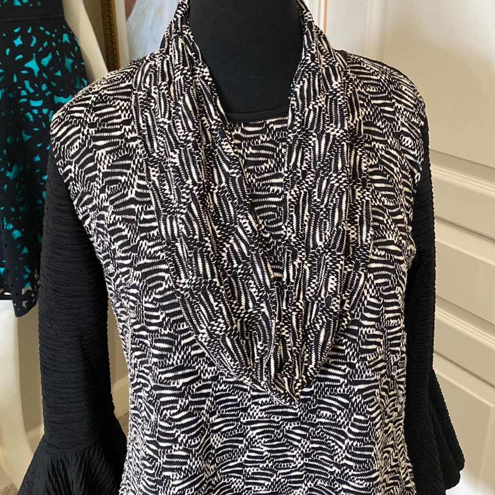 Stay awhile in a gorgeous multi media sweater! The pullover style fab!